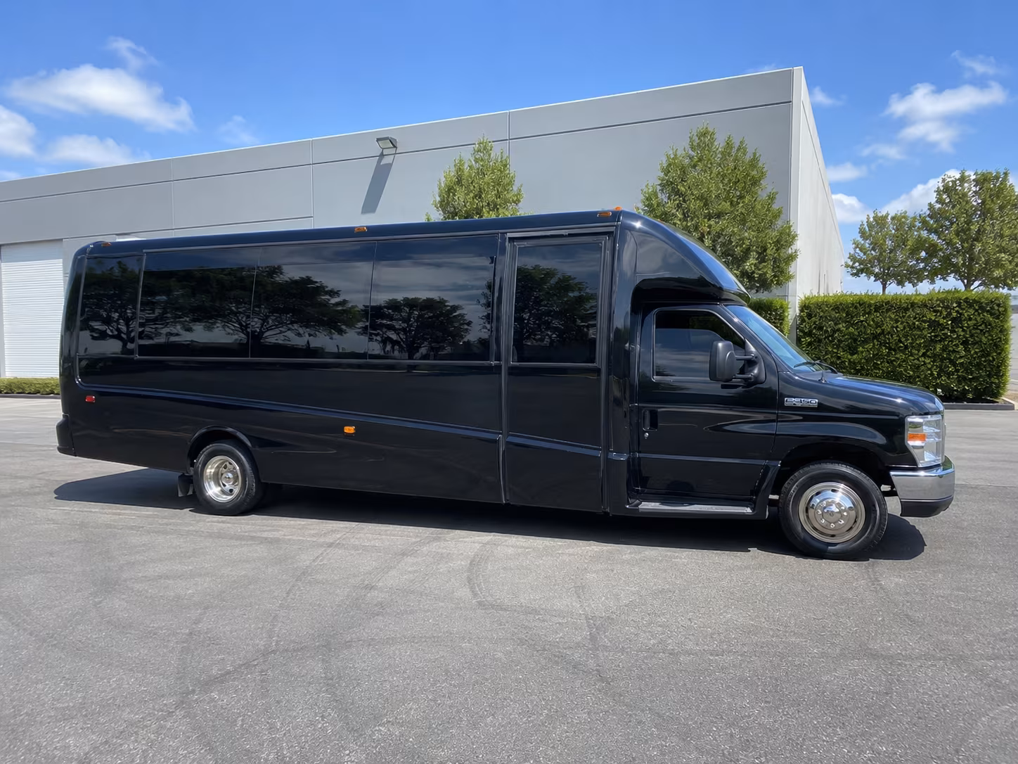 Wedding guests seated inside a party bus serving Greensboro
